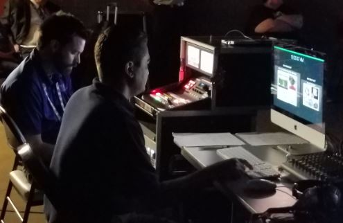 Two BISD Technology employees supporting an educational event